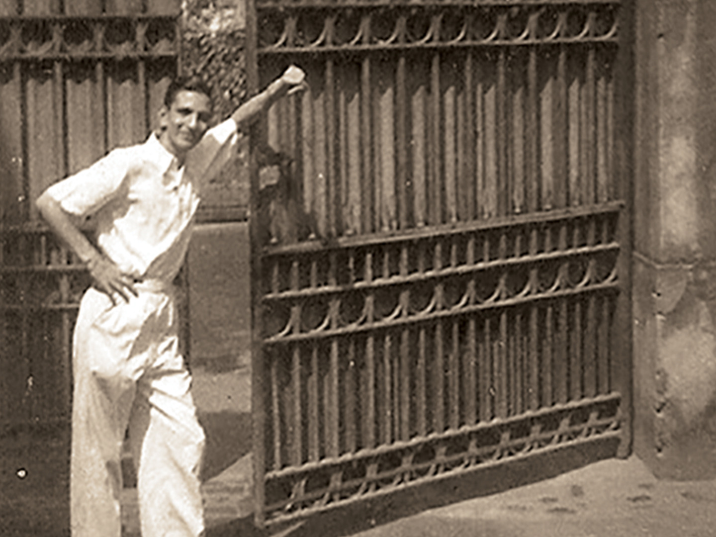 Michael Joseph Martin shown outside the gates of the Armenian College in Kolkata in 1946.