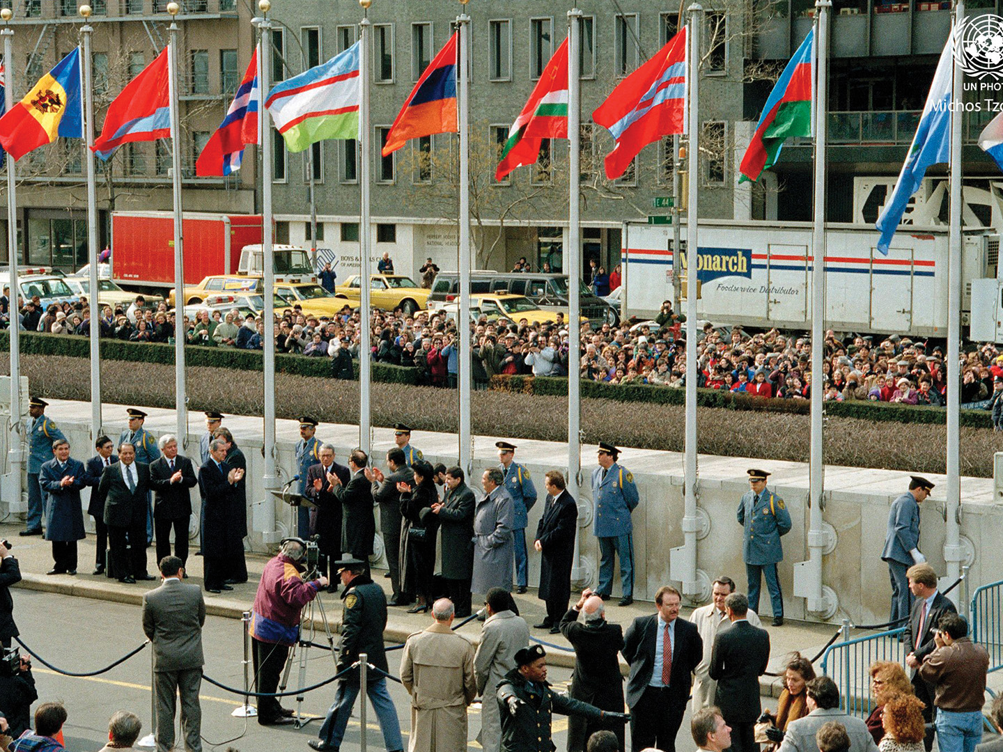 Representatives of the Armenian Mission to the United Nations and members of the local Armenian Diaspora witness the raising of the Armenian tri-color at the United Nations in 1992.