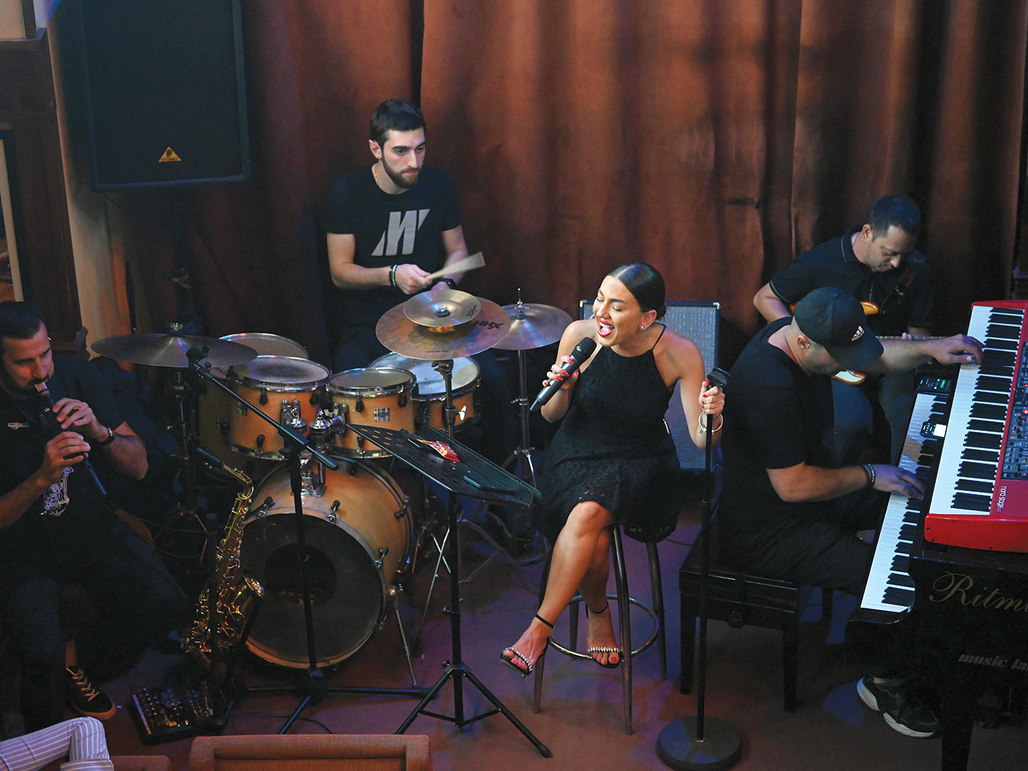 Jazz singer Karina Arustamyan performs at the Malkhas Jazz Club in Yerevan, 2021.
