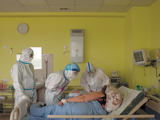 Nurses check on a patient in the resuscitation department of Artashat Medical CenterMedical Center.