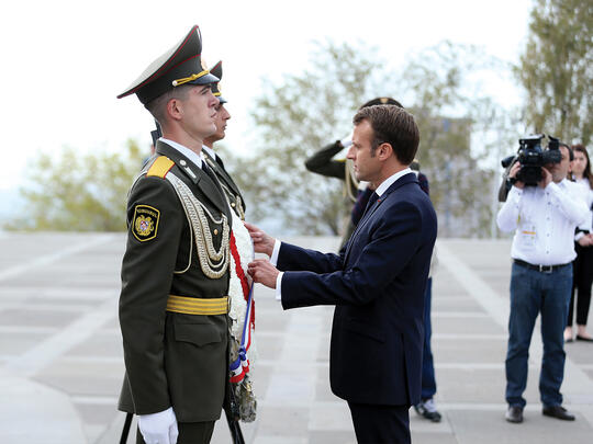 President Macron lays a wreath on behalf of the French people at the Tsitsernakaberd Memorial Complex.