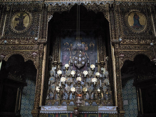 Main Altar. The vast and gilded structure stands atop the burial place of St. James the Lesser, brother of Christ and the first bishop of Jerusalem. The elevated altar is covered with paintings of saints and martyrs.