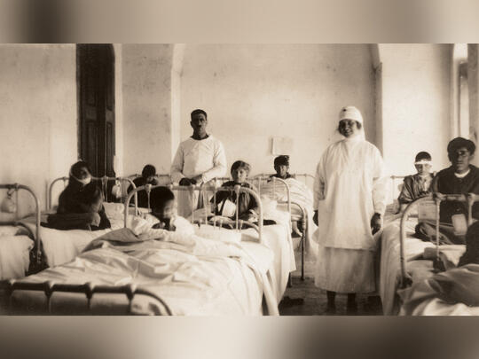 Ellen Mary Gerard and Armenian doctor in contagious ward of orphanage hospital, Aleppo 1921