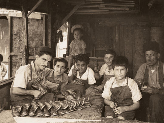 Second-generation Lebanese-Armenian youth learn the shoemaking trade.