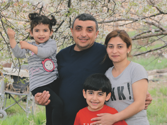 Armen Yessayan with his wife Meline and their two children