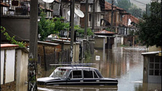 A Bulgarian town is submerged in flood waters. Last summer's