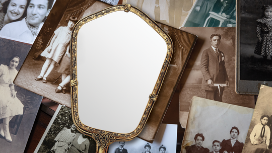 A mirror on vintage family photos