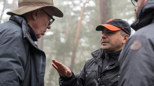 Behind-the-scenes with producer Eric Esrailian with director Terry George.